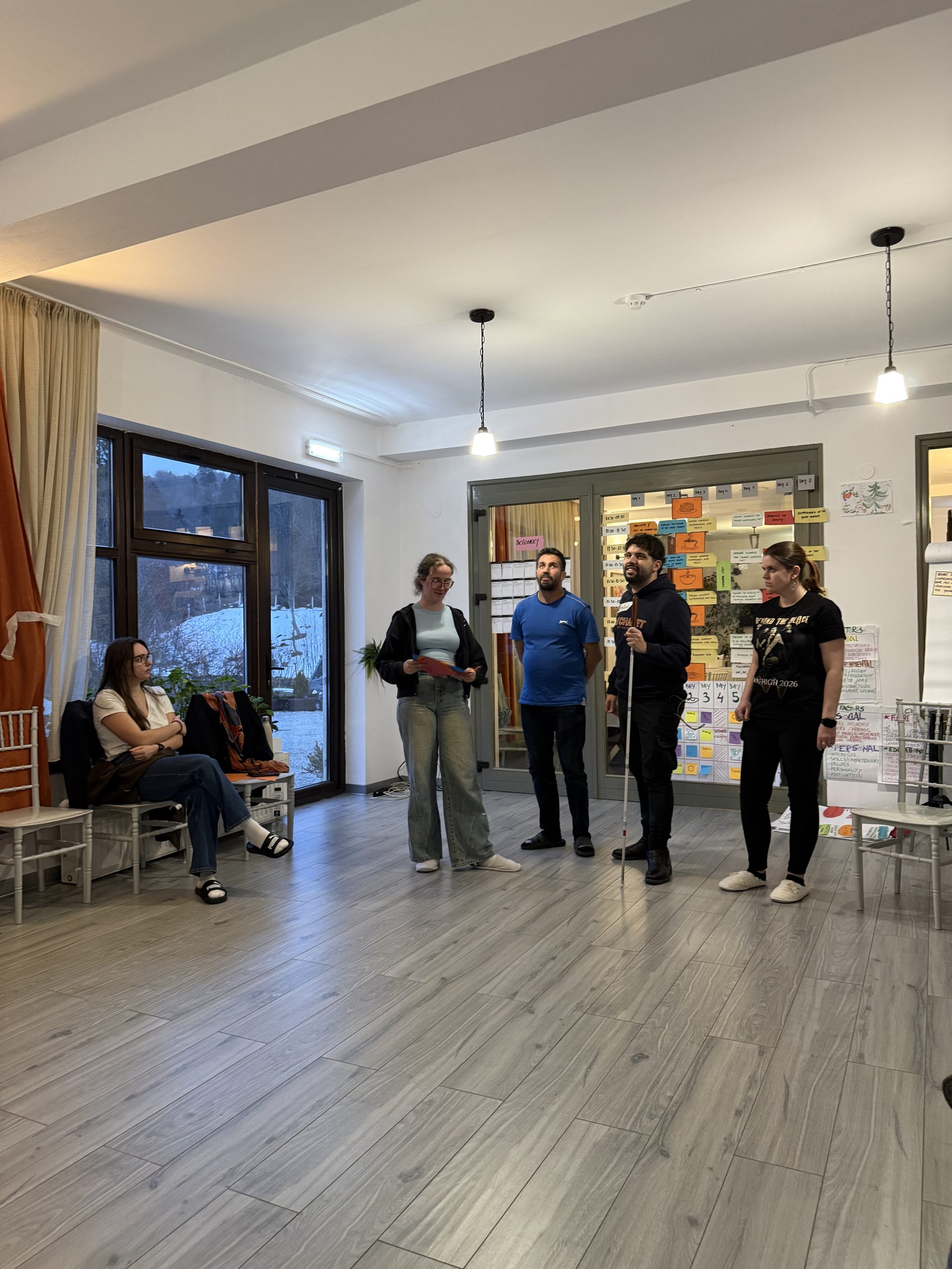 Photo of the Belgian team standing and presenting an activity.
